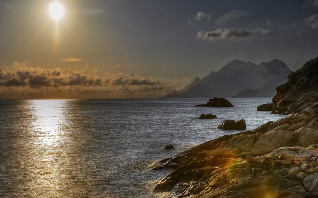 Sunset mountains rocks water reflection free wallpaper for desktop - medium preview image