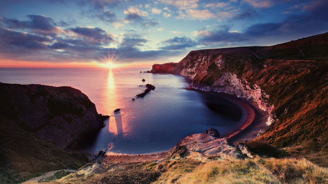 Sunset lake cliff lighthouse rocks free wallpaper for desktop - medium preview image