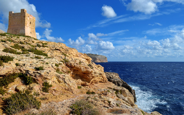 Rocky cliff tower ocean sky free wallpaper for desktop - medium preview image