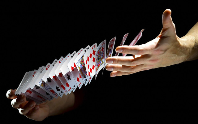 Hand stack cards black background free wallpaper for desktop - medium preview image