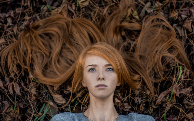 Red haired woman blowing wind free wallpaper for desktop - medium preview image