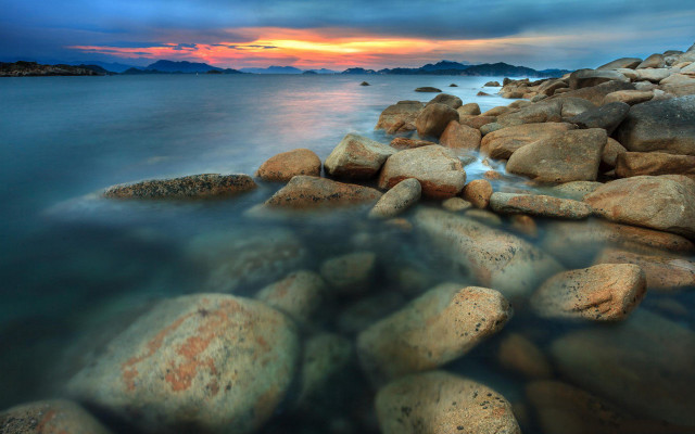Rocky beach sunset water rocks free wallpaper for desktop - medium preview image