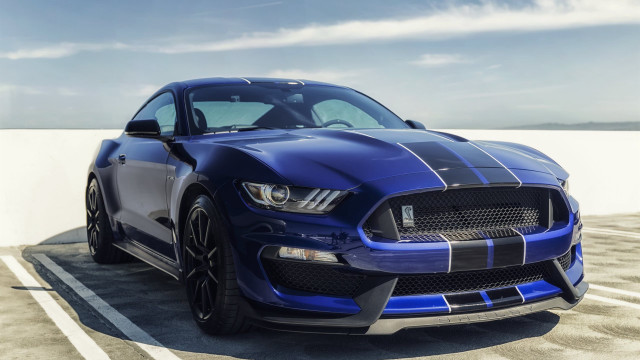 Blue mustang parking lot clouds free wallpaper for desktop - medium preview image