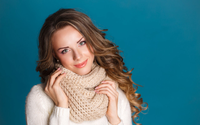 Woman smiling blue background fur free wallpaper for desktop - medium preview image