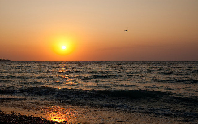 Plane ocean sunset horizon cloud free wallpaper for desktop - medium preview image