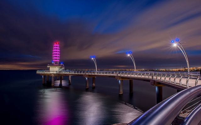 Long bridge lit tower night free wallpaper for desktop - medium preview image