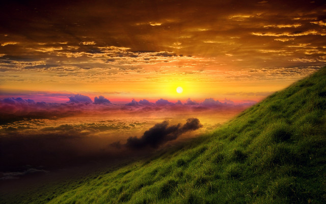 Grassy hill sunset clouds cityscape free wallpaper for desktop - medium preview image
