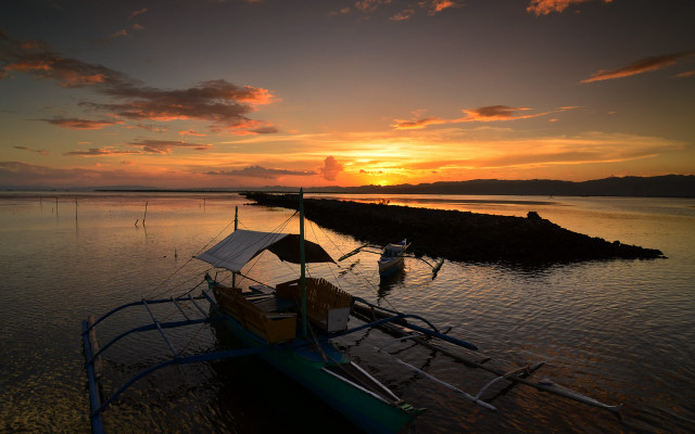 Boat sunset water clouds beach free wallpaper for desktop - medium preview image