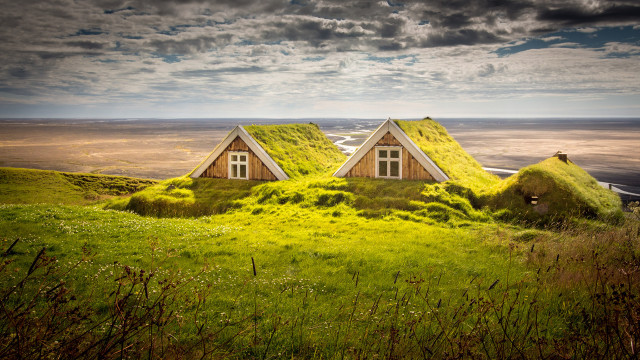 Two houses grass roof hill free wallpaper for desktop - medium preview image