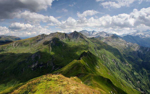 Mountain range grassy slope clouds #2 free wallpaper for desktop - medium preview image