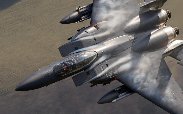 Jet fighter smoke landing precisionism free wallpaper for desktop - medium preview image