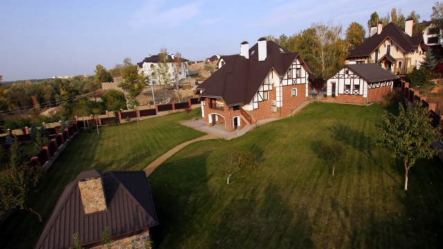 Large house brown roof green free wallpaper for desktop - medium preview image