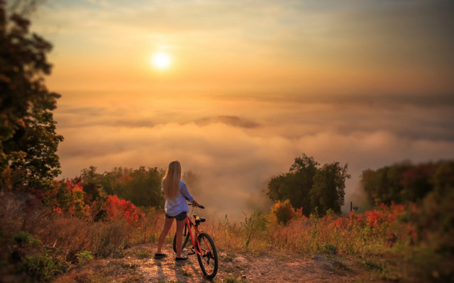 Mountain woman bike clouds autumn free wallpaper for desktop - medium preview image