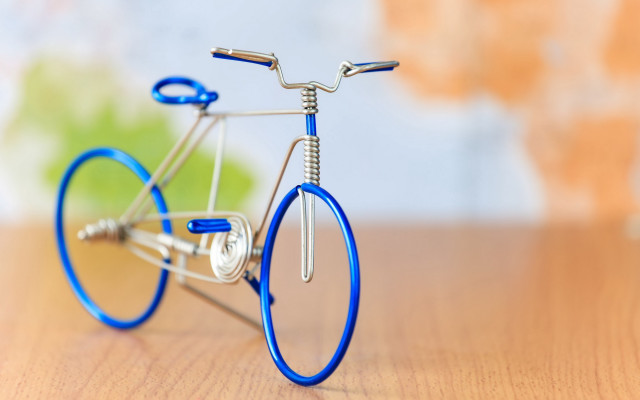 Miniature bicycle wooden table green free wallpaper for desktop - medium preview image