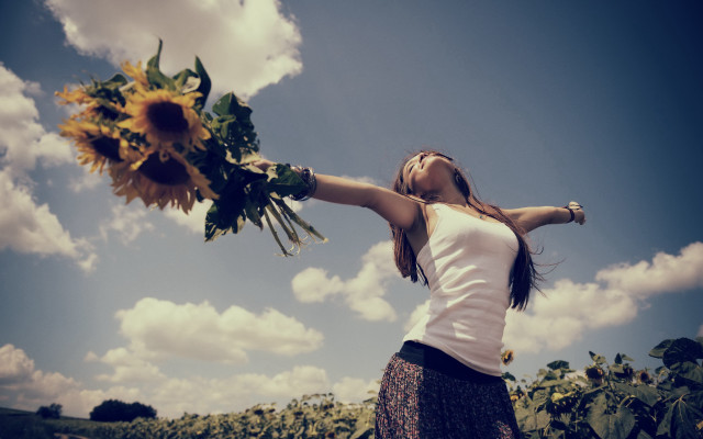Sunflower woman outstretched arms blue free wallpaper for desktop - medium preview image