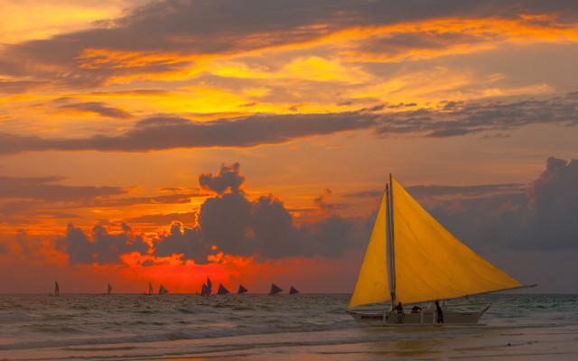 Sailboat ocean sunset cloudy sky free wallpaper for desktop - medium preview image