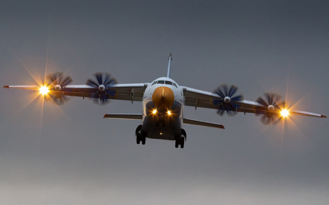 Airplane lights sky clouds backlit free wallpaper for desktop - medium preview image