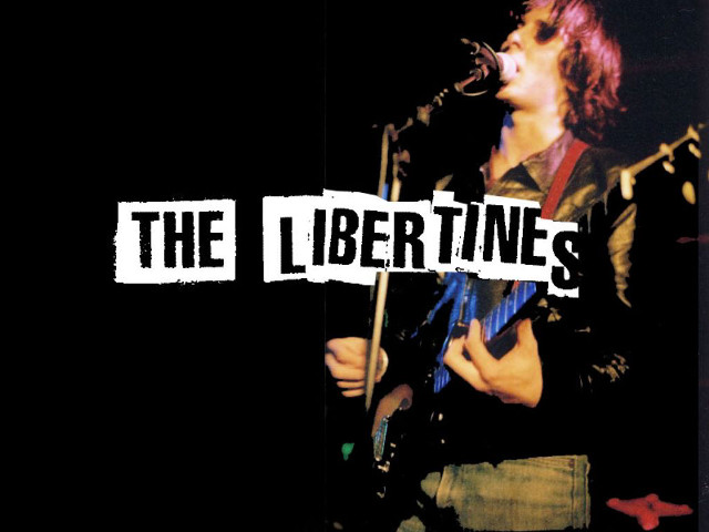 Man holding guitar singing microphone free wallpaper for desktop - medium preview image