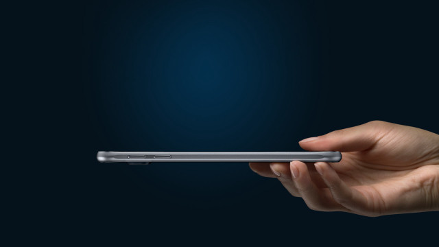 Hand silver tablet blue light free wallpaper for desktop - medium preview image