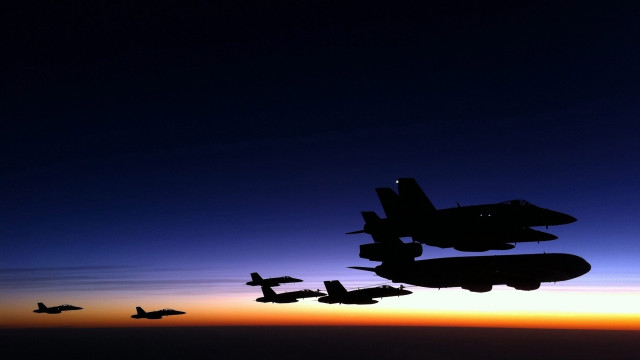 Fighter jet formation sunset backlit free wallpaper for desktop - medium preview image