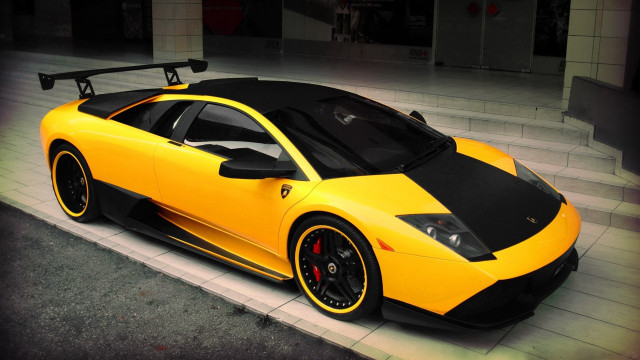Yellow black sports car parking free wallpaper for desktop - medium preview image