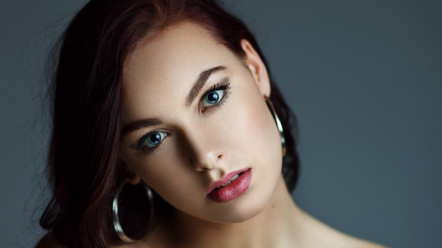 Woman red hair hoop ears free wallpaper for desktop - medium preview image