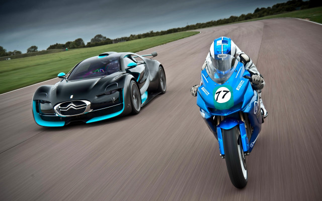 Two motorcycles driving blue black free wallpaper for desktop - medium preview image