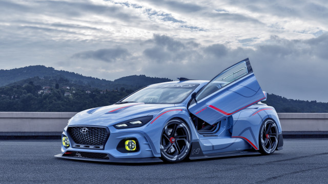 Blue car road mountains clouds free wallpaper for desktop - medium preview image