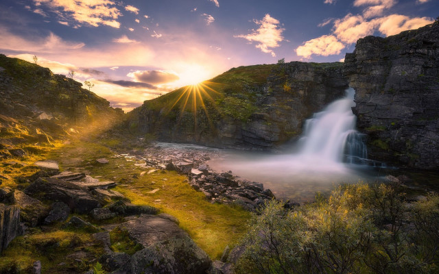 Waterfall sunshine clouds grass rocks free wallpaper for desktop - medium preview image