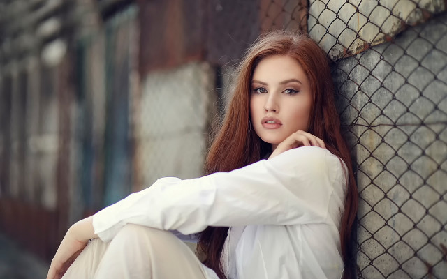 Woman fence hands on knees free wallpaper for desktop - medium preview image