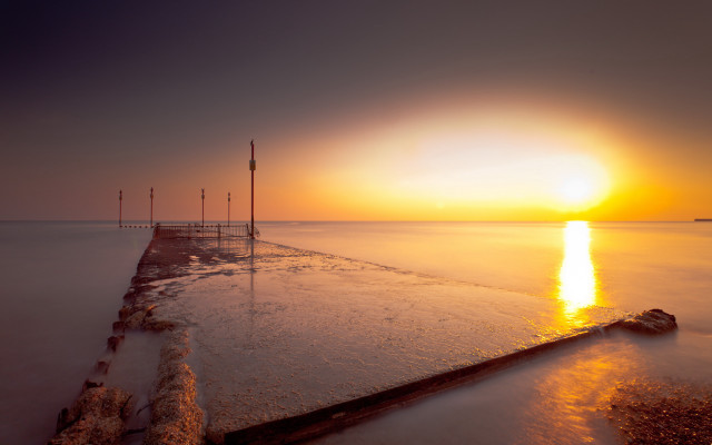 Long pier sunset water poles free wallpaper for desktop - medium preview image