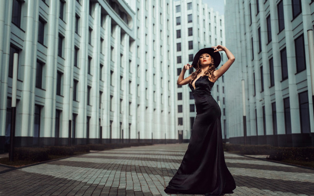 Woman black dress hat city free wallpaper for desktop - medium preview image