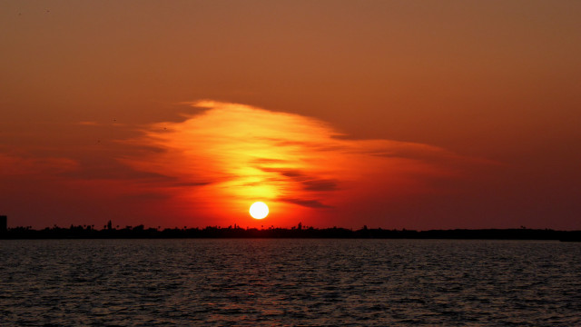 Sunset water boat tower mountain free wallpaper for desktop - medium preview image