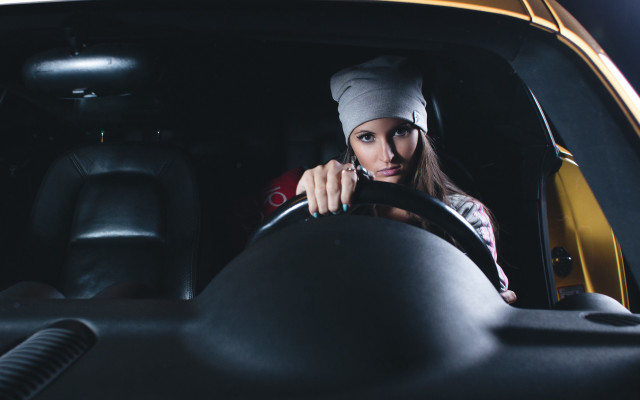 Woman driving car headband steering free wallpaper for desktop - medium preview image