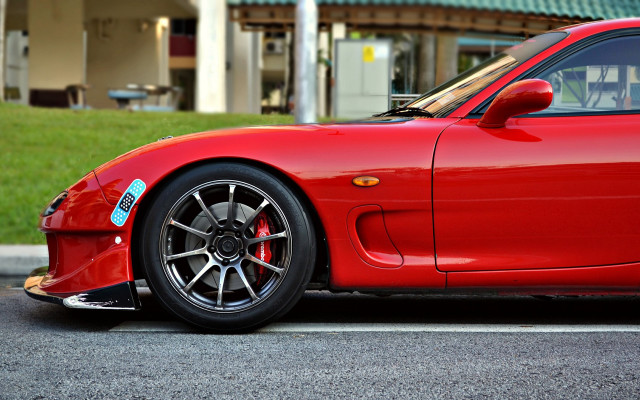 Red sports car parked building #3 free wallpaper for desktop - medium preview image