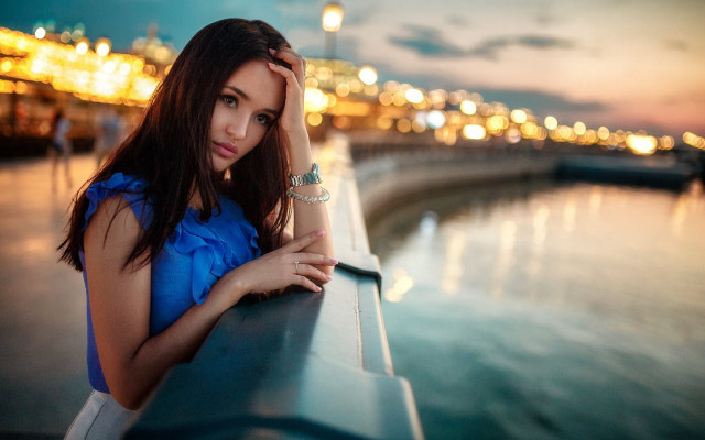 Woman waterfront night city lights free wallpaper for desktop - medium preview image