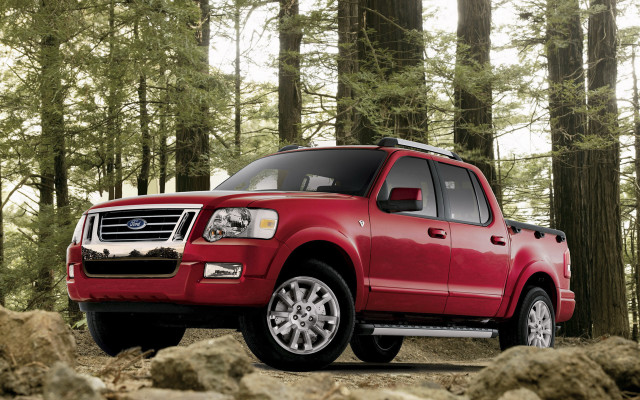 Red truck forest rocks bush free wallpaper for desktop - medium preview image