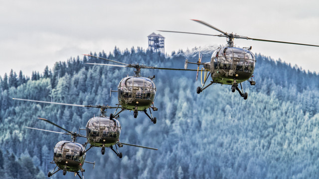 Helicopters forest hills tower mountains free wallpaper for desktop - medium preview image