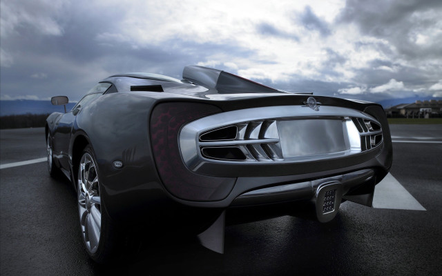 Futuristic car cloudy sky building free wallpaper for desktop - medium preview image