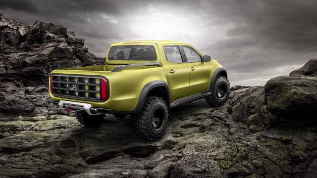 Yellow truck rocky terrain cloudy free wallpaper for desktop - medium preview image