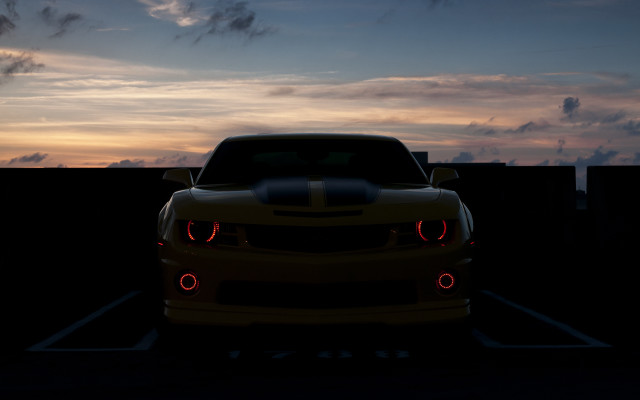Yellow car dusk parking lot free wallpaper for desktop - medium preview image