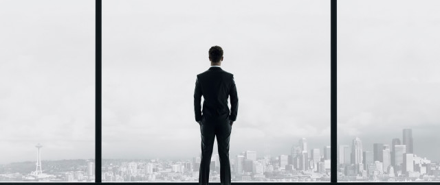 Man suit window cityscape skyscraper free wallpaper for desktop - medium preview image