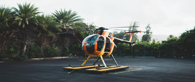 Helicopter parking lot forest bush free wallpaper for desktop - medium preview image