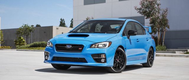 Blue subaru parking lot building free wallpaper for desktop - medium preview image