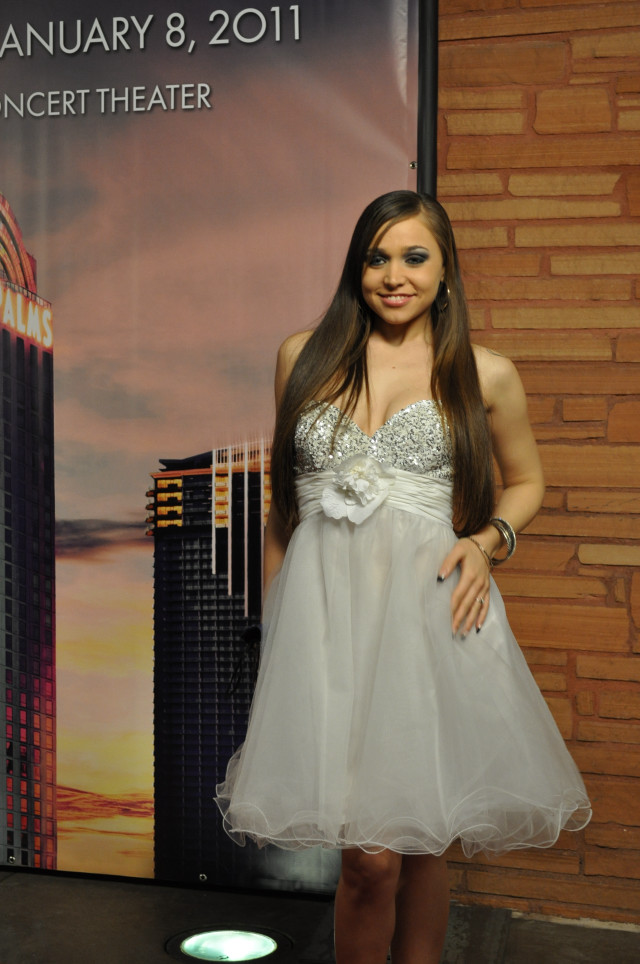 Woman white dress cityscape poster free wallpaper for mobile - medium preview image