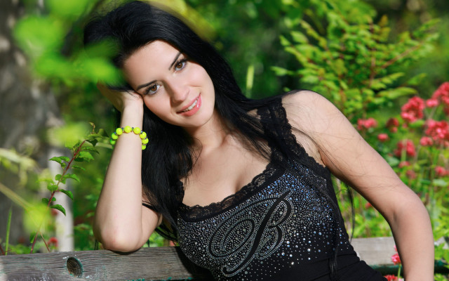 Woman black dress garden portrait #2 free wallpaper for desktop - medium preview image