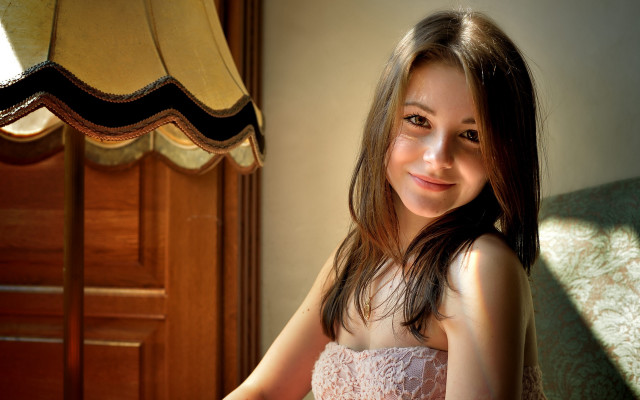 Woman white dress smiling couch free wallpaper for desktop - medium preview image