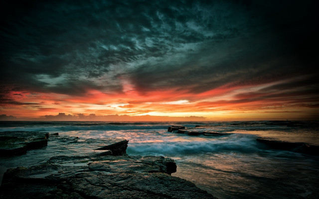 Sunset ocean boat rocks cloudy free wallpaper for desktop - medium preview image