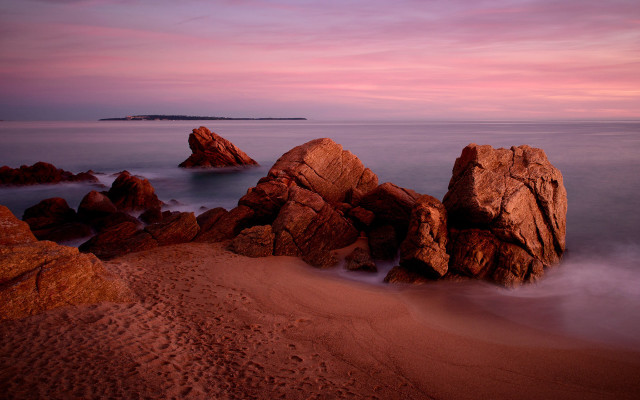 Rocky beach pink sky ocean free wallpaper for desktop - medium preview image