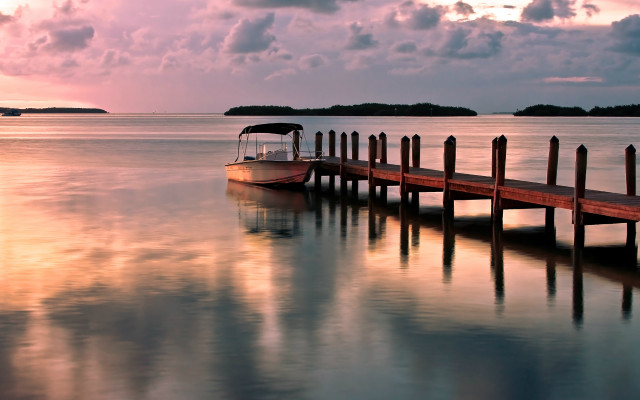 Lake sunset dock boat clouds free wallpaper for desktop - medium preview image